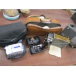 Vintage Campro camera, Sony movie cam with accessories, projector with a bag of reels and one