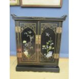 A lacquered jewellery cabinet with mother of pearl and gilt and hand painted detail 47cmH 39cmD