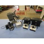 Vintage Polaroid cameras and film projector