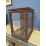 A glass display case 47cmH x 39cmD x 35cmW