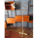 Angle poise floor lamp on castors