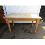 A pine kitchen table 136x76cmx79cmH