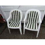 2 Plastic garden chairs with seat pads