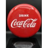 An original Coca-Cola enamel button sign 35.5cm diameter