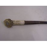 A horn on hazel walking stick with coin detail to top