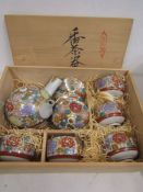 A Japanese tea set in wooden gift box