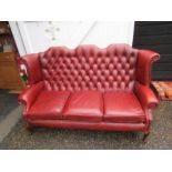 Ox blood red Chesterfield style Queen Anne wingback 3 seater sofa