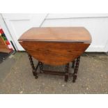 Oak drop leaf table with barley twist legs H74cm W81cm D45cm approx