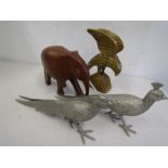 A pair white metal pheasants, a treen elephant and treen eagle/hawk