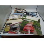 Assorted Lotus automobilia photographs