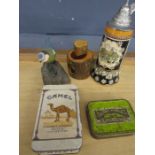 'silver' 1072 dollar, Musical stein, nut cracker, bird figurine and 2 vintage tobacco tins