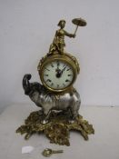 Brevattato brass and pewter mantle clock in the form of an elephant supporting a dial and movement