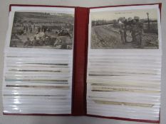80 Daily Mirror photographic postcards in red album