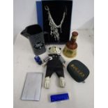 Black & White whiskey jug and Bells, mini Boules, wooden jointed bear, necklace, cigarette case
