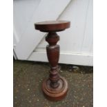 A plant/candle stand