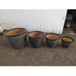 Set of 4 graduated ceramic garden pots. Largest H33cm approx