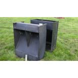 two gravity fed pig feeders