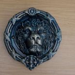 Lion head door knocker