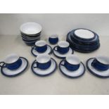 Denby tableware in midnight blue comprising 6 cups and saucers,4 dinner plates, 4 side plates, 6