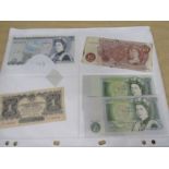 Paper money 2 x green 1 pound, brown 10 shillings, 1 x blue £5 and Russian note