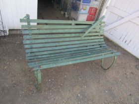 Wrought iron garden bench with wooden slats (in need of repair as seen in pictures)