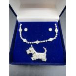 A diamanté necklace and earring set with Scottie dog brooch