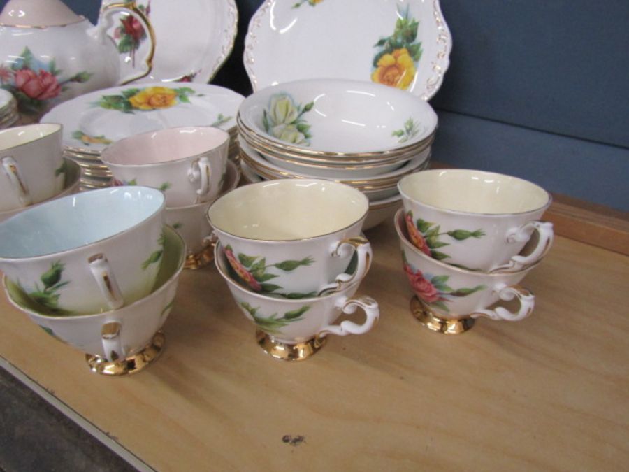 Paragon Wheatcroft part tea set comprised of teapot, 11 saucers, 9 cups, 13 tea plates, 8 desssert - Image 6 of 8