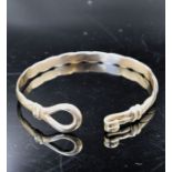 9ct gold bangle with a hoop and hook clasp, 17.5grams dated 1919, Sheffield