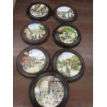 7 Royal Doulton plates in hanging frames country collection