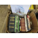 Vintage books and a box certified historic newspapers