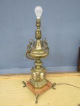 Ornate brass table lamp with marble base