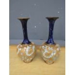 Pair of Doulton Lambeth vases H25cm approx (damage to top of one vase as shown in pictures)