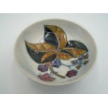 Moorcroft bramble pattern footed bowl decorated with blackberries and autumn leaves, approx 11.5cm