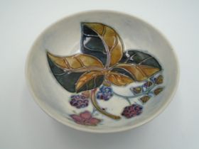 Moorcroft bramble pattern footed bowl decorated with blackberries and autumn leaves, approx 11.5cm