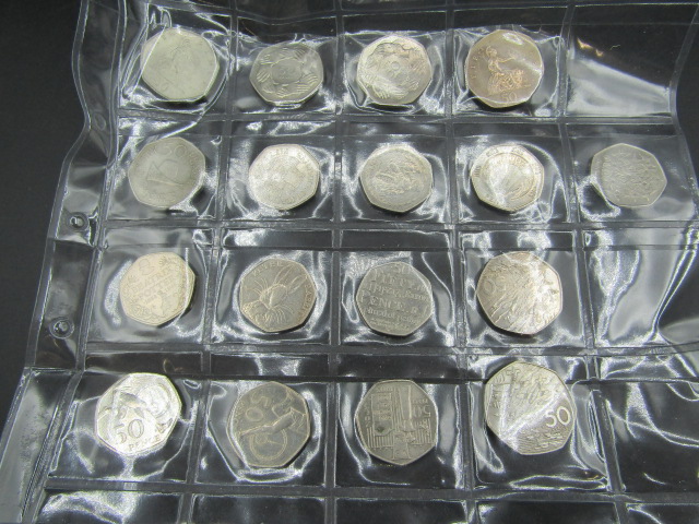 17 50p coins inc Suffragette, Isle of Mann TT, Beatrix Potter, D-Day etc