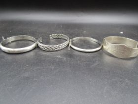 2 silver bangles 44gms and 2 white metal bangles 25gms