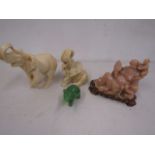Elephants and Buddha sculptures in onyx/resin/jade?