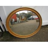 Gilt framed oval wall mirror 65cm x 75cm approx