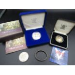 Silver £5 Trafalgar coin, silver £2 piedfort coin, ER11 crown and a childs silver bangle 5.5gms