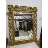 Ornate gilt bevelled mirror 93x73cm