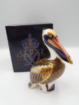 Royal Crown Derby Brown Pelican paperweight with gold stopper, approx 13cm tall, boxed
