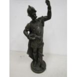 A brass? Spanish warlord? lamp base, a flamed light is missing from his hands 44cmH