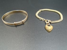 Two child's gold bracelets - Christening bangle marked 9ct metal core 4.34g, other marked rolled