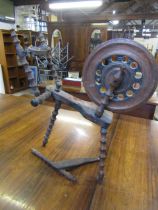 vintage wooden spinning wheel with bobbin legs