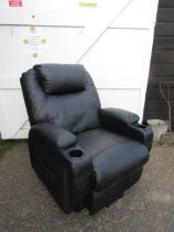 Electric reclining armchair with cup holders and remote from a house clearance