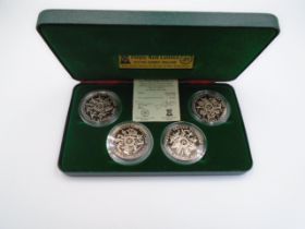 4 Isle of Man Crowns in a green box (Pobjoy mint Ltd)