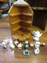 Mini teapots with a display stand pus another pine display shelf