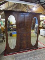 Mahogany Armoire with 4 central drawers and 2 door cupboard flanked by large mirror doors (in 5