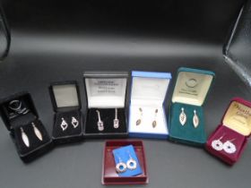 7 pairs of earings - to include sterling silver pairs, all boxed. to include Ola Gorie