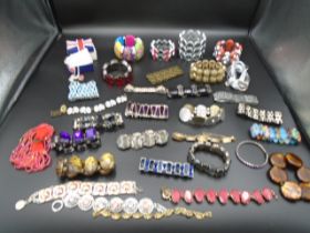 A bag of costume jewellery bracelets